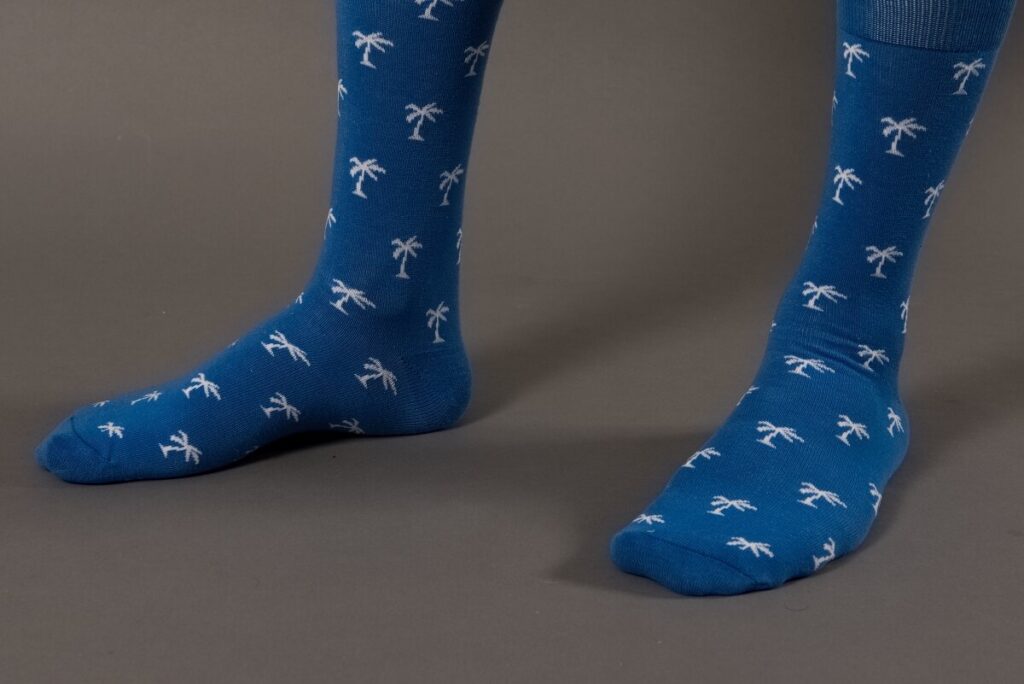 blue socks with white palm trees